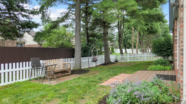 1067 Acadia Ct, Indianapolis, IN 46217 - fenced backyard featuring a wooden deck