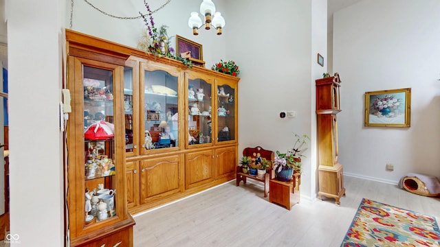 1067 Acadia Ct, Indianapolis, IN 46217 - detailed view of wood finished floors and a chandelier