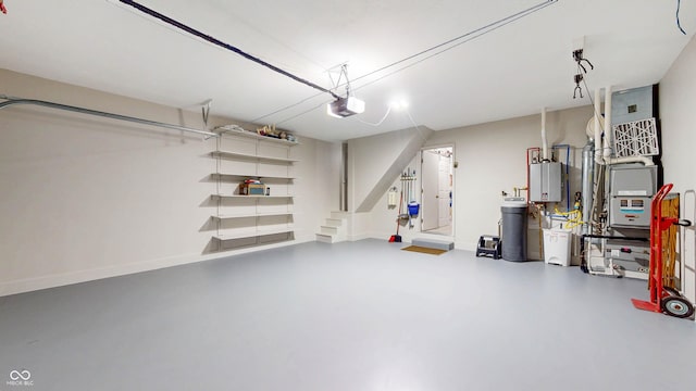 1067 Acadia Ct, Indianapolis, IN 46217 - garage featuring tankless water heater and a garage door opener