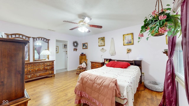 1067 Acadia Ct, Indianapolis, IN 46217 - bedroom featuring wood finished floors and ceiling fan