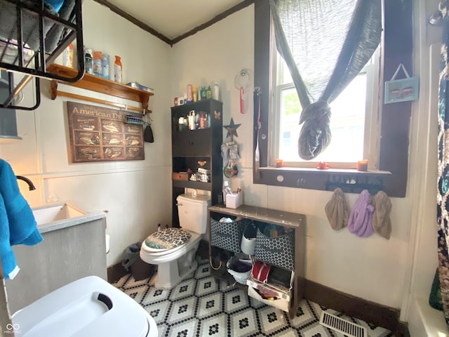 403 N College Ave, Greencastle, IN 46135 - full bath with crown molding, vanity, a shower with curtain, and a tub