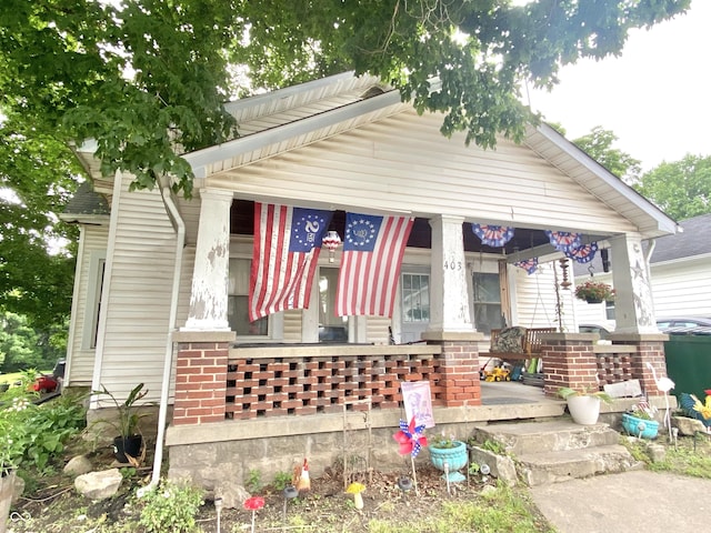403 N College Ave, Greencastle, IN 46135 - view of front of property featuring a porch and brick siding