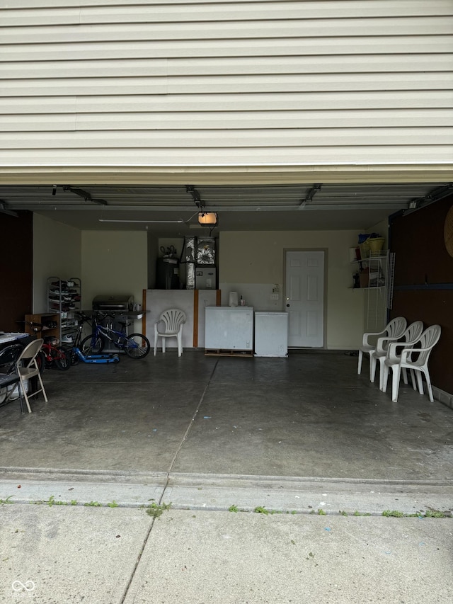 8113 Maple Stream Ln, Indianapolis, IN 46217 - garage with a garage door opener