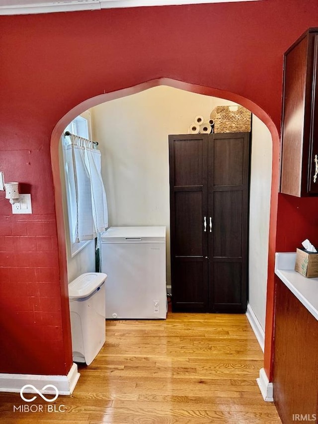313 S Brittain Ave, Muncie, IN 47303 - bathroom featuring wood finished floors and baseboards