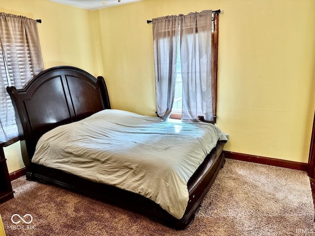 313 S Brittain Ave, Muncie, IN 47303 - carpeted bedroom featuring multiple windows