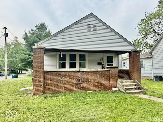 313 S Brittain Ave, Muncie, IN 47303 - view of front of property with a front lawn and brick siding