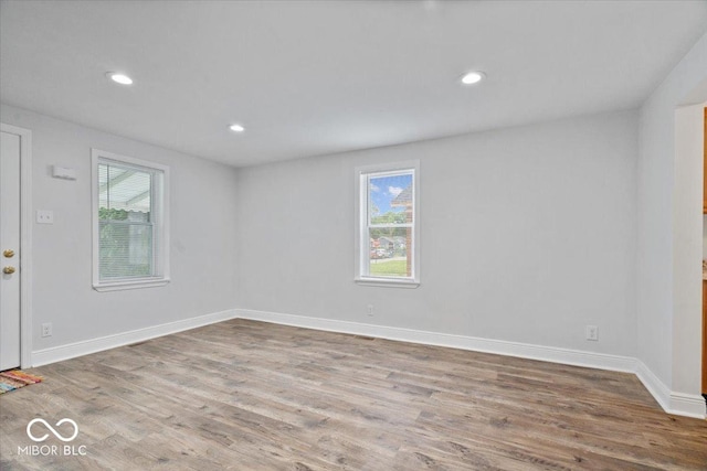 4310 Crittenden Ave, Indianapolis, IN 46205 - spare room with wood finished floors and recessed lighting