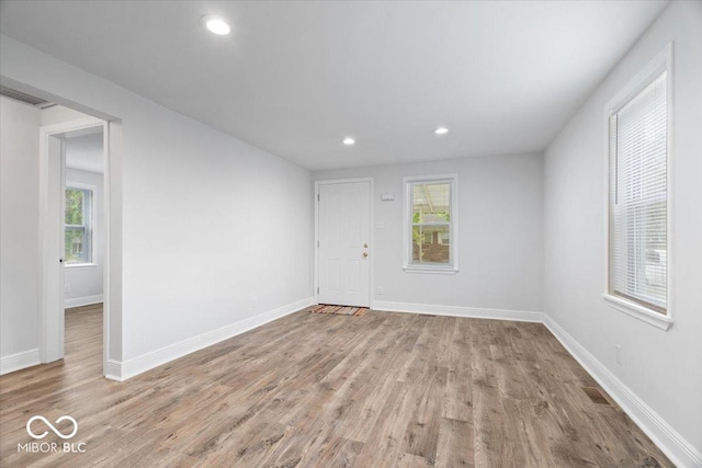 4310 Crittenden Ave, Indianapolis, IN 46205 - empty room with wood finished floors and recessed lighting