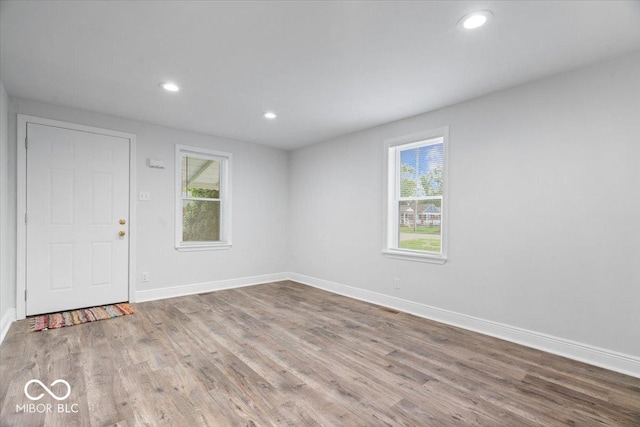 4310 Crittenden Ave, Indianapolis, IN 46205 - foyer entrance featuring healthy amount of natural light, wood finished floors, and recessed lighting