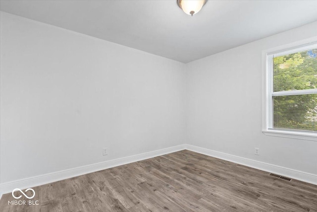 4310 Crittenden Ave, Indianapolis, IN 46205 - spare room with wood finished floors and baseboards