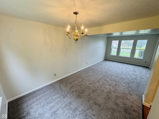5938 Tybalt Ln, Indianapolis, IN 46254 - carpeted spare room with a chandelier and a textured ceiling
