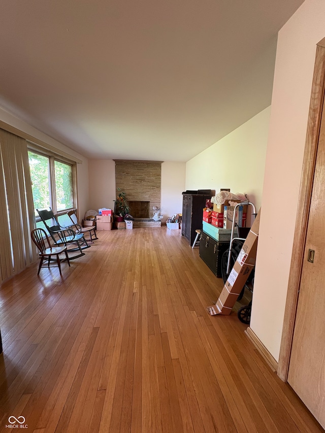 4609 Andover Rd, Indianapolis, IN 46226 - living room featuring a fireplace and hardwood / wood-style floors