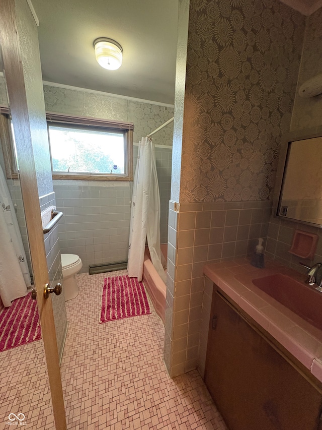 4609 Andover Rd, Indianapolis, IN 46226 - bathroom featuring wallpapered walls, tile walls, vanity, wainscoting, and shower / bath combination with curtain