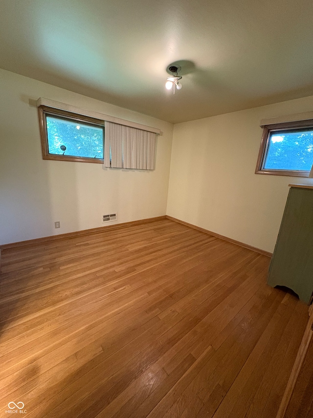 4609 Andover Rd, Indianapolis, IN 46226 - unfurnished room featuring wood finished floors and baseboards