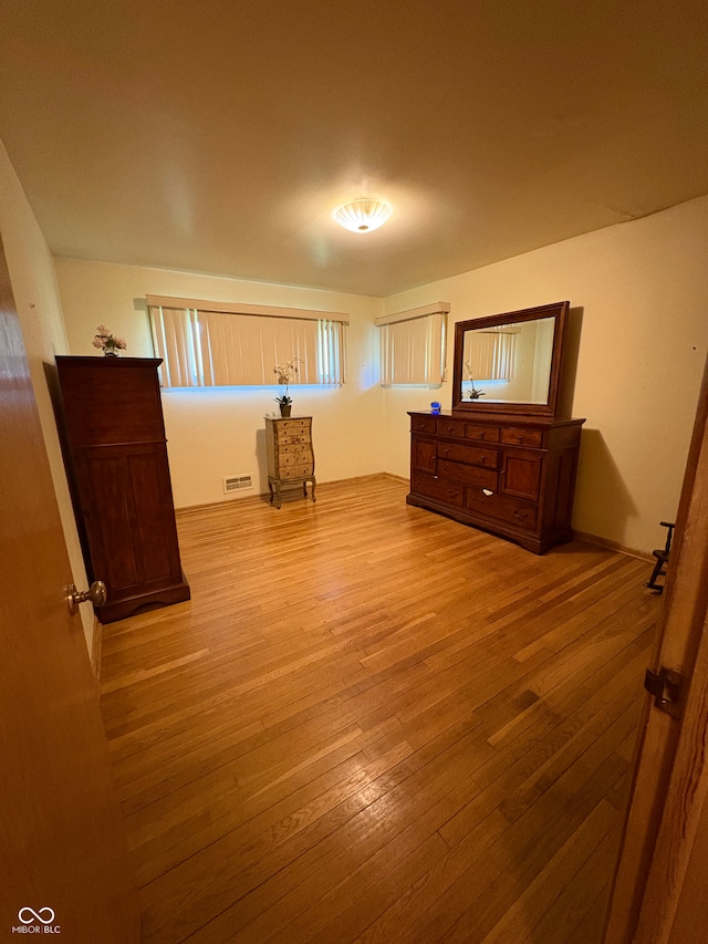 4609 Andover Rd, Indianapolis, IN 46226 - unfurnished bedroom featuring wood-type flooring