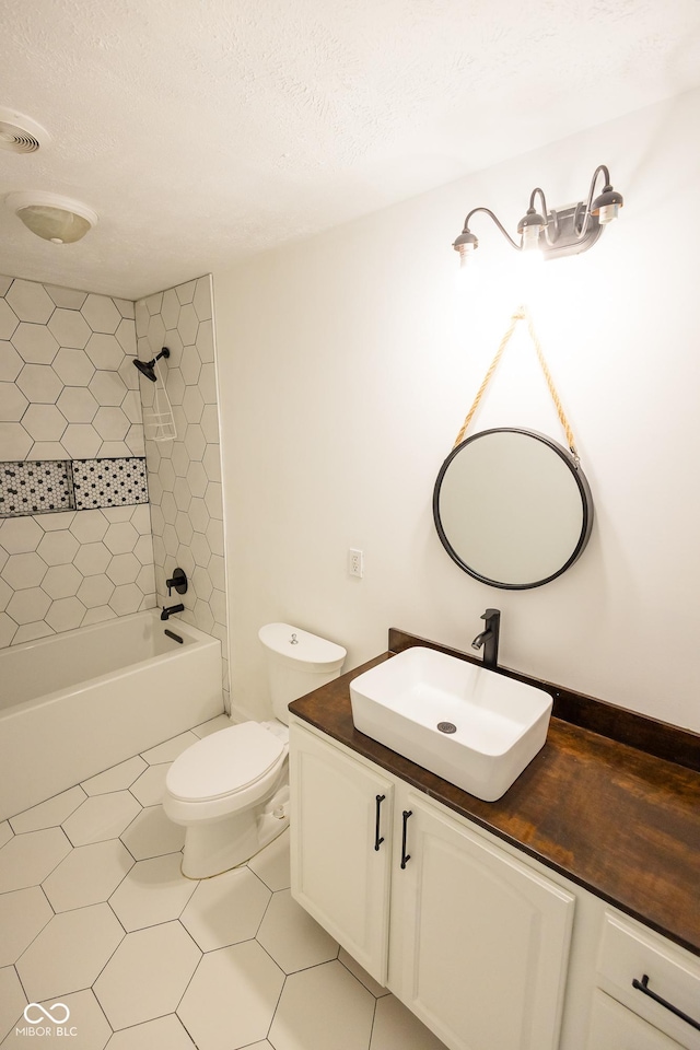 7493 W Lane Rd, Mccordsville, IN 46055 - full bathroom featuring vanity, bathtub / shower combination, a textured ceiling, and tile patterned flooring
