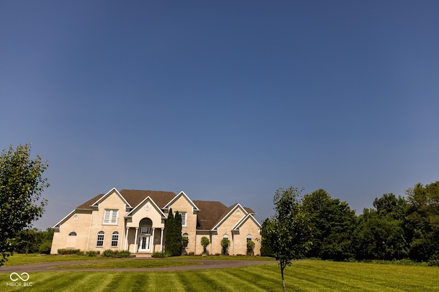 7493 W Lane Rd, Mccordsville, IN 46055 - view of front of home with a front lawn