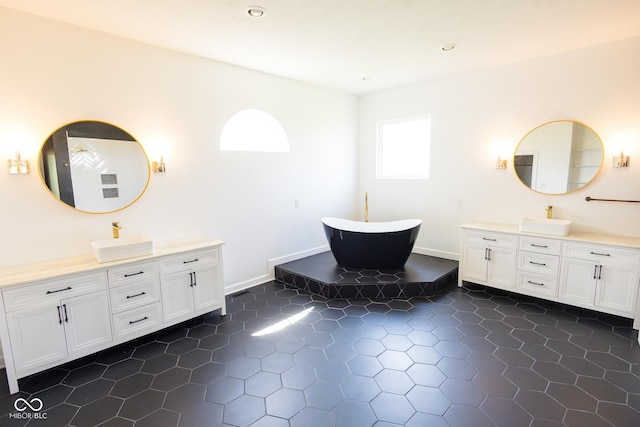 7493 W Lane Rd, Mccordsville, IN 46055 - full bath with vanity, a freestanding bath, tile patterned flooring, and recessed lighting
