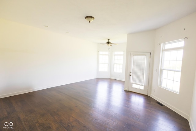 7493 W Lane Rd, Mccordsville, IN 46055 - spare room featuring ceiling fan and dark wood-type flooring