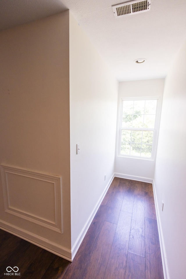 7493 W Lane Rd, Mccordsville, IN 46055 - spare room with dark wood-style flooring and baseboards