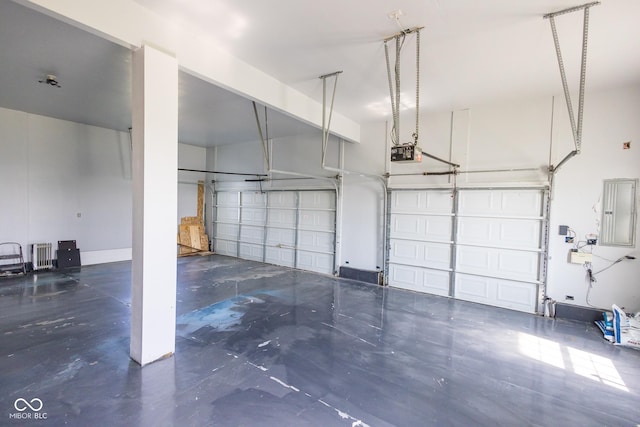 7493 W Lane Rd, Mccordsville, IN 46055 - garage featuring electric panel and a garage door opener