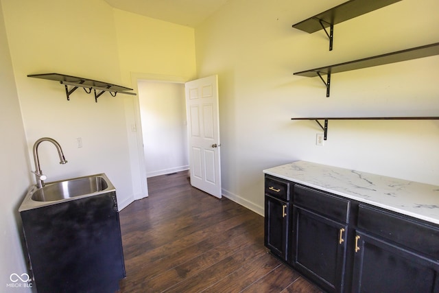 7493 W Lane Rd, Mccordsville, IN 46055 - kitchen featuring open shelves, dark wood finished floors, and dark cabinetry