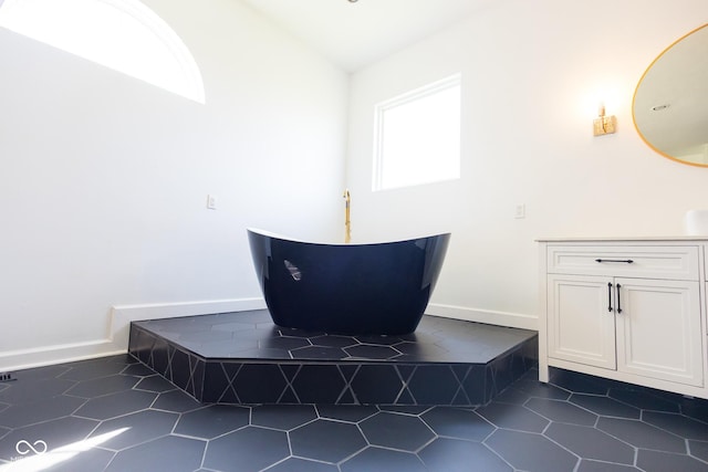 7493 W Lane Rd, Mccordsville, IN 46055 - unfurnished room with dark tile patterned floors and lofted ceiling