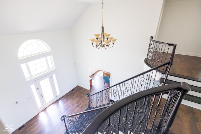 7493 W Lane Rd, Mccordsville, IN 46055 - foyer entrance with a chandelier, wood finished floors, and high vaulted ceiling