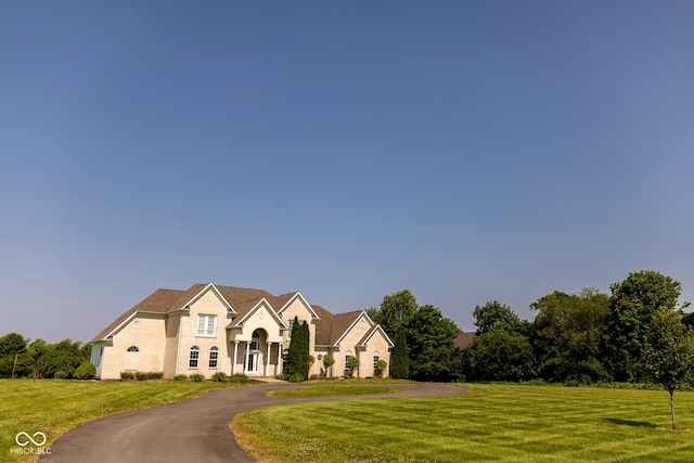 7493 W Lane Rd, Mccordsville, IN 46055 - french provincial home featuring a front yard