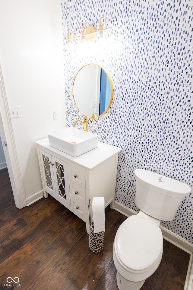 7493 W Lane Rd, Mccordsville, IN 46055 - bathroom with vanity, wood finished floors, and wallpapered walls