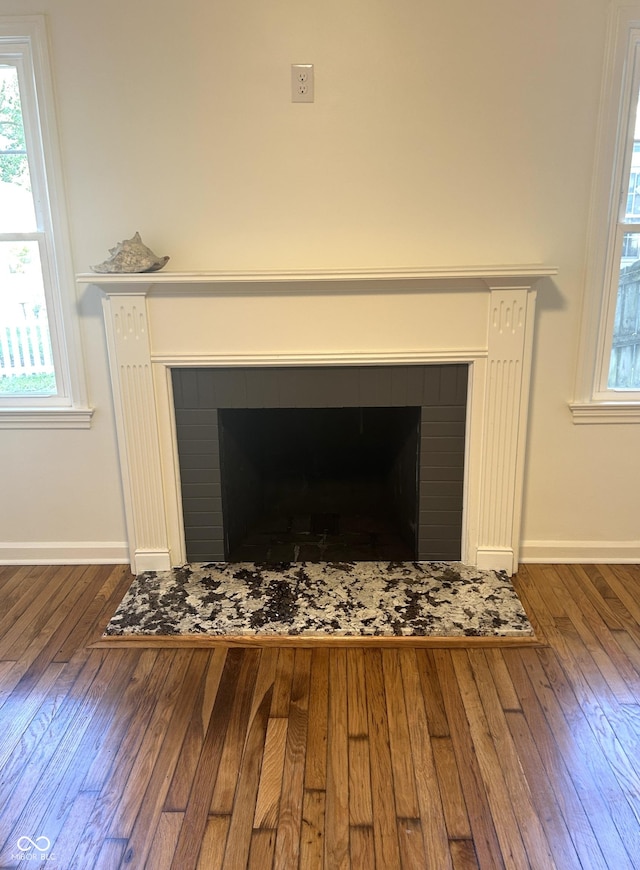 2631 Mcleay Dr, Indianapolis, IN 46220 - detailed view of wood finished floors and a tile fireplace