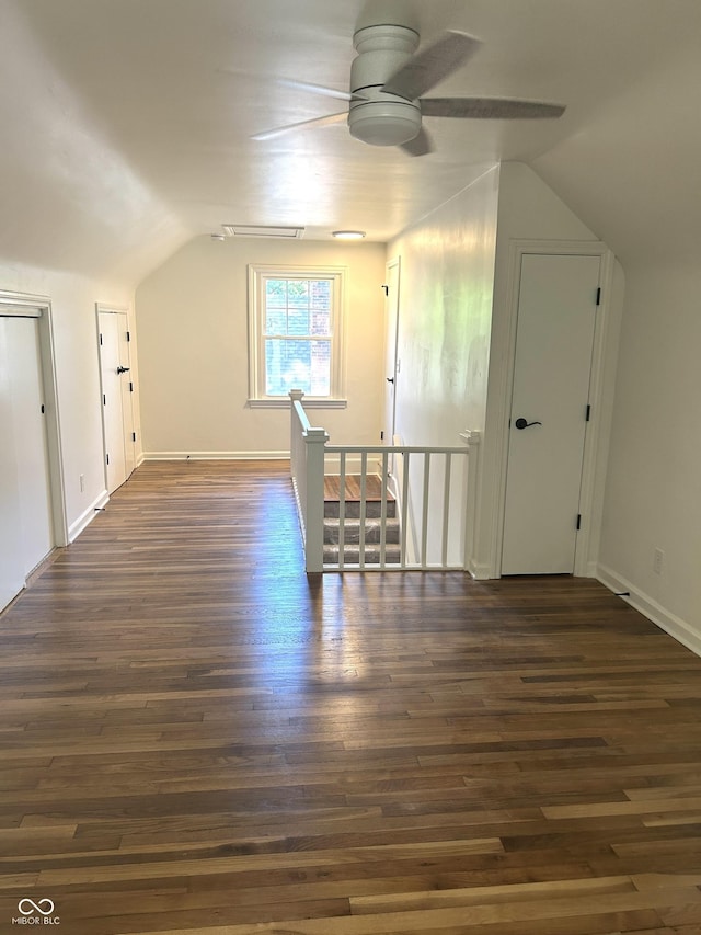 2631 Mcleay Dr, Indianapolis, IN 46220 - additional living space featuring lofted ceiling, ceiling fan, and dark wood-style floors
