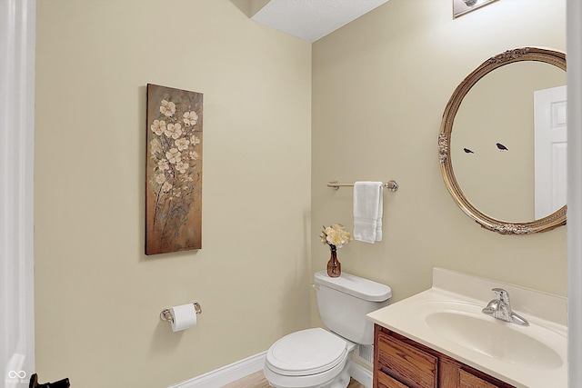 6050 Acorn Dr, Columbus, IN 47201 - half bathroom featuring toilet and vanity