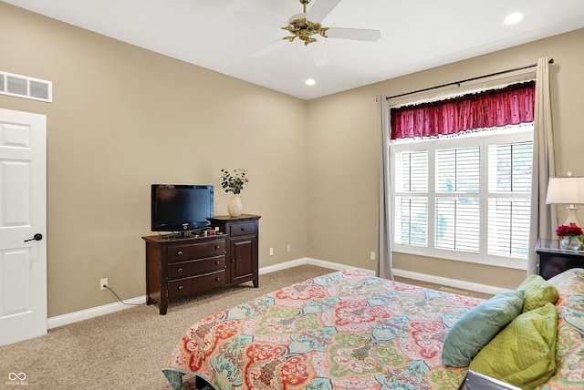 6050 Acorn Dr, Columbus, IN 47201 - bedroom featuring light carpet, recessed lighting, and a ceiling fan