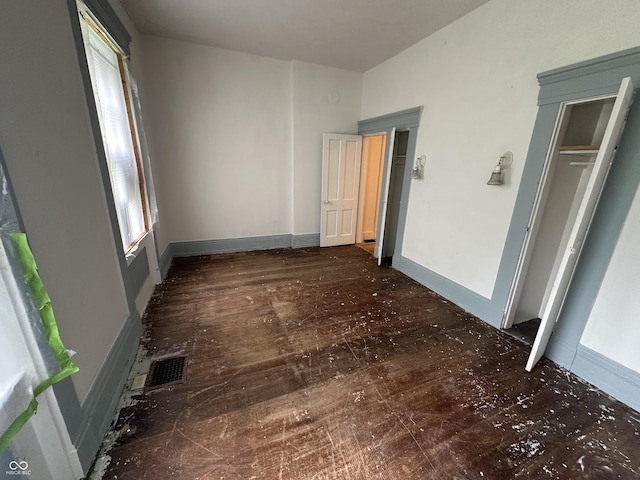 6100 Hodgin Rd, Richmond, IN 47374 - unfurnished bedroom with hardwood / wood-style flooring and baseboards