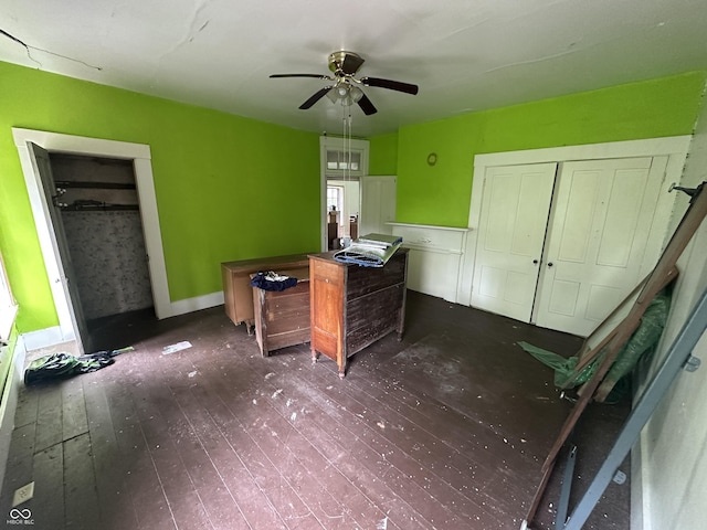 6100 Hodgin Rd, Richmond, IN 47374 - home office with dark wood-style floors and a ceiling fan