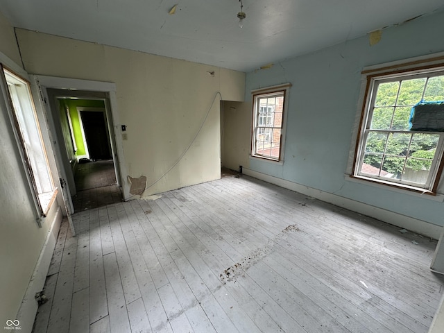 6100 Hodgin Rd, Richmond, IN 47374 - spare room with light wood-style floors and plenty of natural light