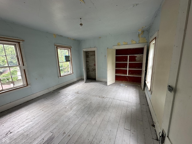 6100 Hodgin Rd, Richmond, IN 47374 - unfurnished bedroom featuring hardwood / wood-style flooring