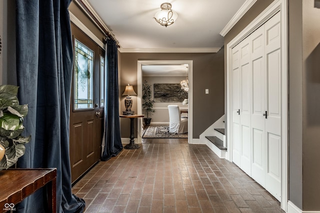 7743 Camelback Dr, Indianapolis, IN 46250 - foyer featuring stairway, crown molding, and brick floors