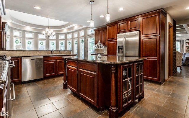 7743 Camelback Dr, Indianapolis, IN 46250 - kitchen featuring stainless steel appliances, a chandelier, recessed lighting, decorative backsplash, and pendant lighting