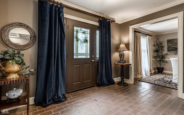 7743 Camelback Dr, Indianapolis, IN 46250 - entryway with brick floors and ornamental molding
