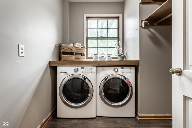 7743 Camelback Dr, Indianapolis, IN 46250 - laundry room featuring washing machine and dryer and wood finished floors