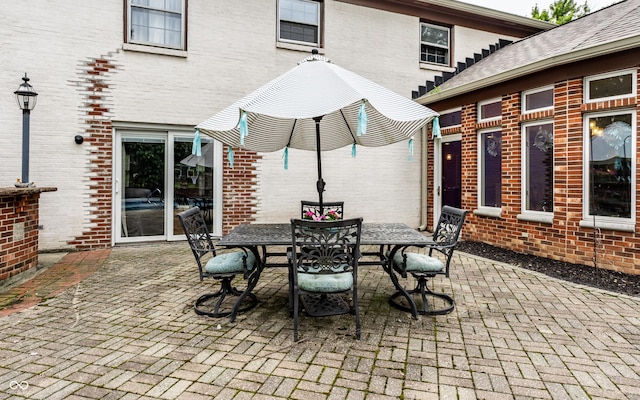 7743 Camelback Dr, Indianapolis, IN 46250 - view of patio featuring outdoor dining area