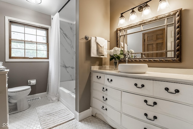 7743 Camelback Dr, Indianapolis, IN 46250 - full bathroom with vanity, shower / bath combo with shower curtain, and tile patterned floors