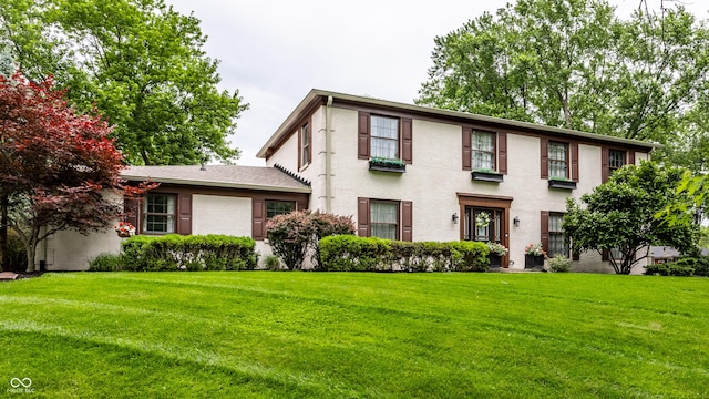 7743 Camelback Dr, Indianapolis, IN 46250 - view of front facade featuring a front yard