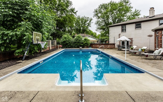 7743 Camelback Dr, Indianapolis, IN 46250 - view of pool featuring a patio and a fenced backyard