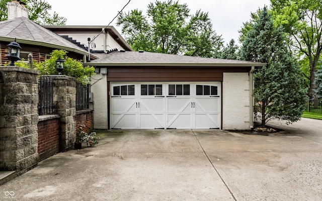 7743 Camelback Dr, Indianapolis, IN 46250 - garage featuring concrete driveway