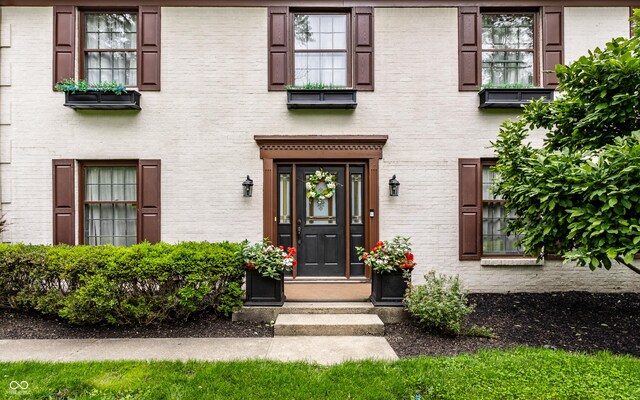 7743 Camelback Dr, Indianapolis, IN 46250 - property entrance with brick siding