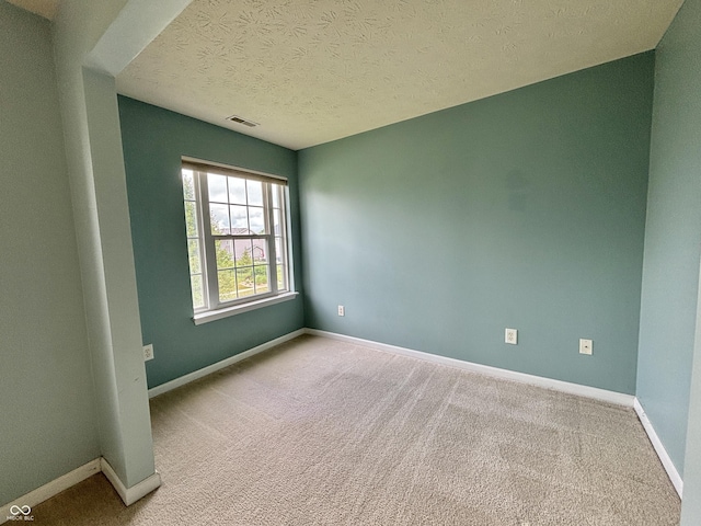 5571 Auburndale Dr, Bargersville, IN 46106 - carpeted empty room featuring a textured ceiling and baseboards