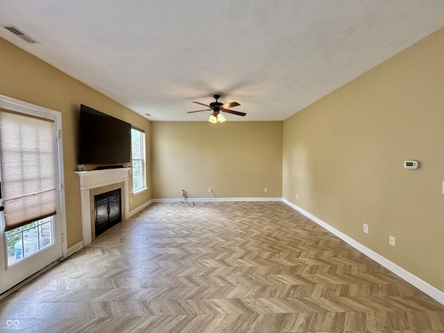5571 Auburndale Dr, Bargersville, IN 46106 - unfurnished living room featuring ceiling fan and a tiled fireplace